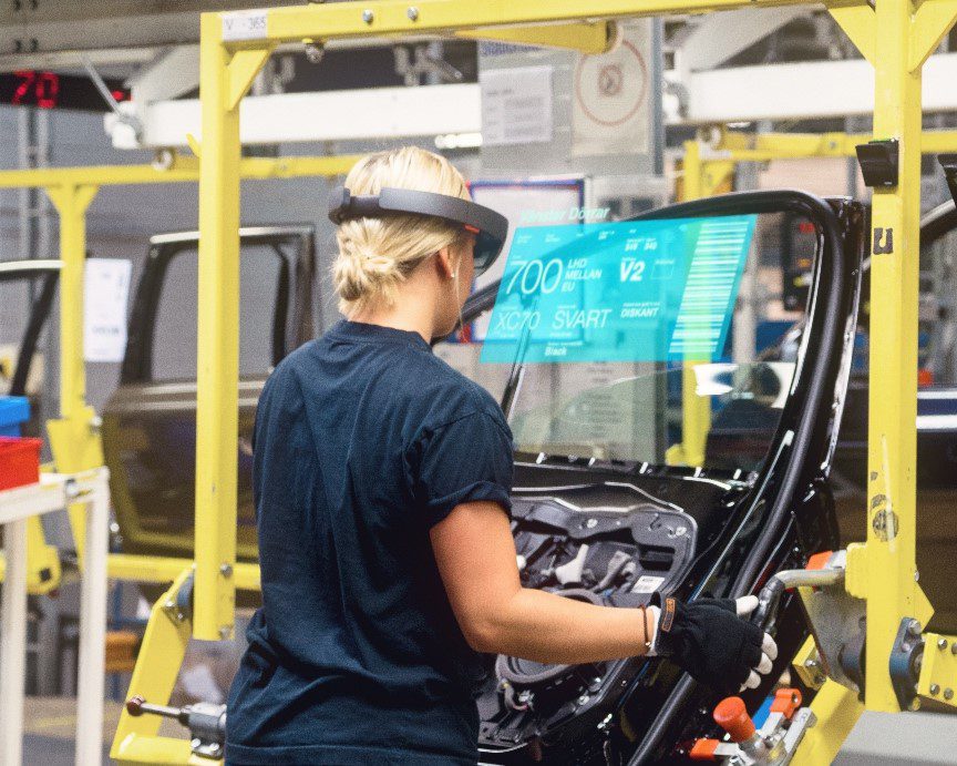 Woman in manufacturing using Microsoft HoloLens