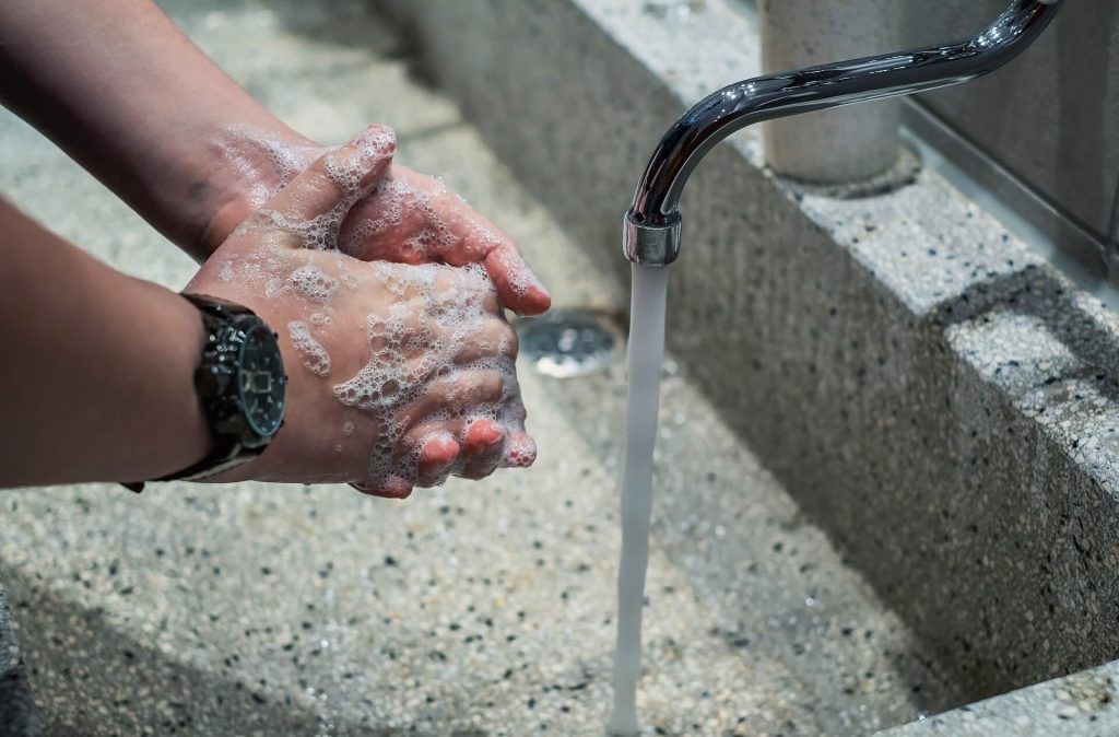 Person washing hands at work