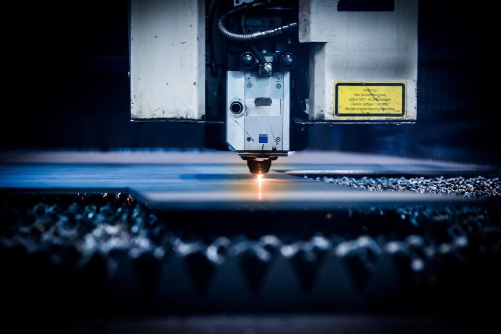 A laser CNC machine working - one of the major manufacturing trends