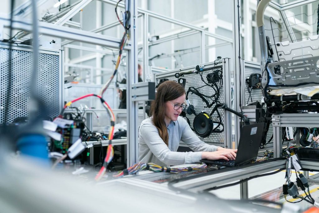 woman in manufacturing preparing different types of training