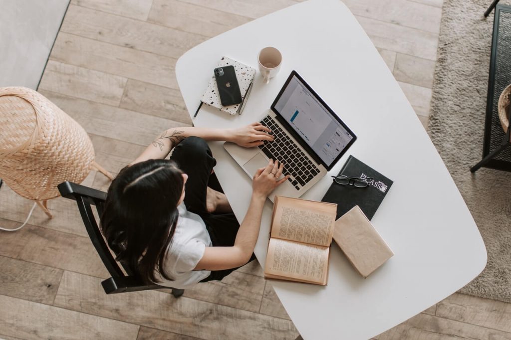 A woman using a laptop as an example of digital skills gap